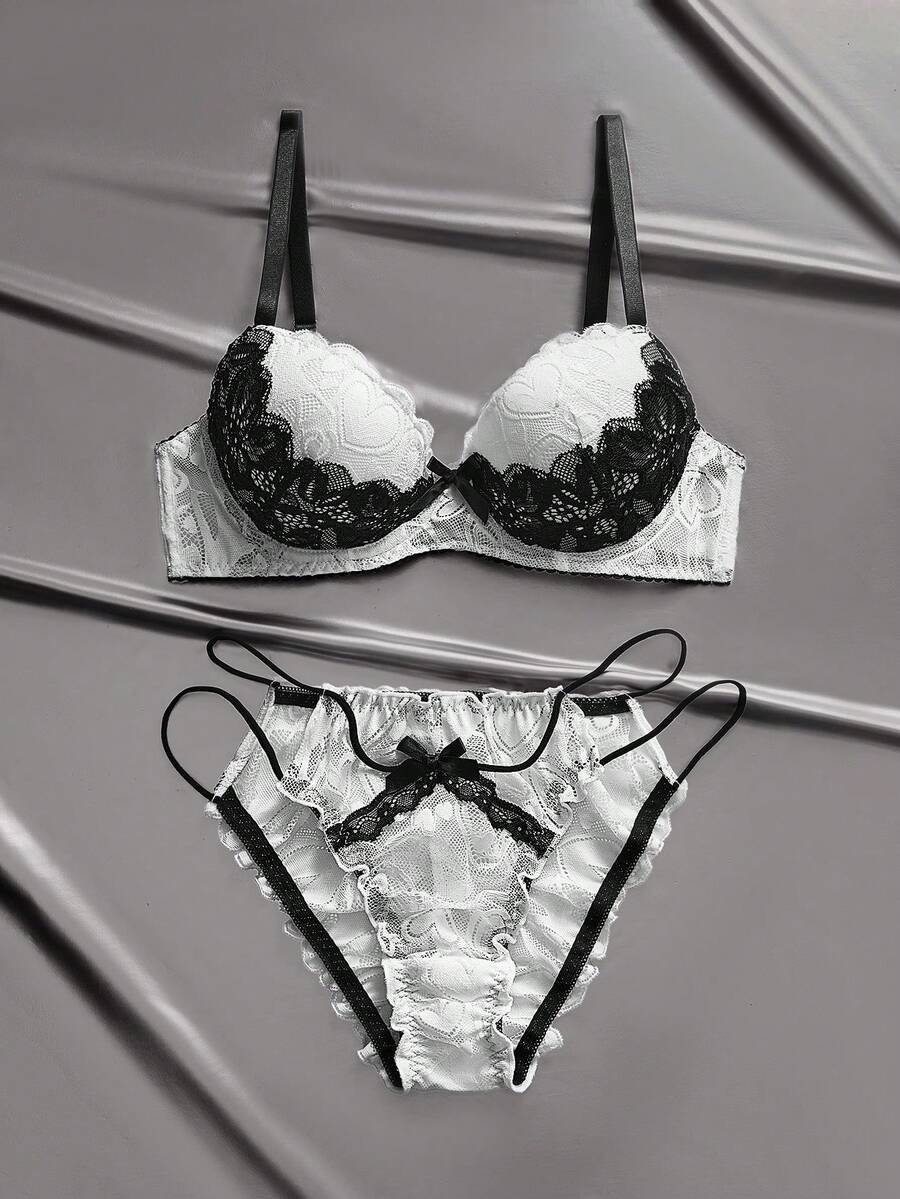 粉色和黑色蕾丝内衣套装，镂空钩编设计，性感细肩带，亲肤贴身