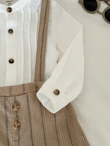 SHEIN 两件套男婴绅士套装，白色长袖衬衫搭配卡其色条纹背带短裤，优雅的春夏套装，适合节日、月龄庆祝、洗礼、迎婴派对、婚礼宾客、花童、戒指童等场合。 - 卡其色 - 查看 6