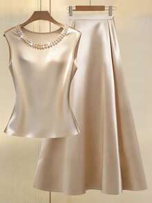 GlowEve 女士珍珠装饰无袖露脐上衣和高腰A字中长裙套装，闪亮面料，优雅精致，适合工作、约会、晚餐、外出等场合，春夏皆宜。 - 杏色 - 查看 1