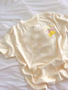 SHEIN 女士休闲柠檬蝴蝶结字母印花短袖T恤，适合日常通勤和度假穿着 - 杏色 - 查看 2