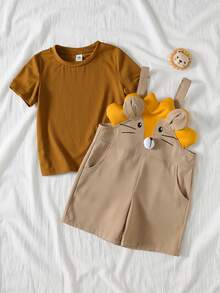THE HAPPY LOOK Set de 2 piezas con parte superior de manga corta de cuello redondo suave de punto con estampado de león de dibujos animados y pantalones de peto para niño pequeño - Caqui - Ver 8