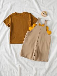 THE HAPPY LOOK Set de 2 piezas con parte superior de manga corta de cuello redondo suave de punto con estampado de león de dibujos animados y pantalones de peto para niño pequeño - Caqui - Ver 2