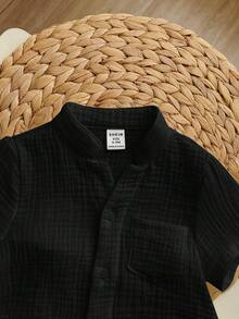 Bộ 2 món gồm áo cardigan cổ tròn tay ngắn và quần short cạp chun cho bé trai hoặc bé gái. - màu đen - Xem 4