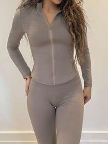 Conjunto deportivo de dos piezas en negro con chaqueta con cremallera y leggings - Caqui - Ver 6