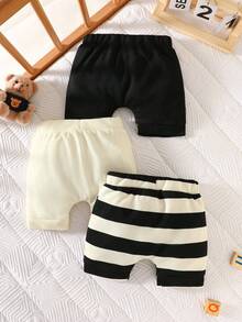 SHEIN Nouveau bébé garçon d'été 3 pièces short rayé noir abricot, short décontracté polyvalent mignon et simple pour nouveau-né. Short bébé garçon 3 pièces, short bébé rayé simple et basique - Multicolore - Voir 3
