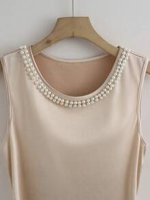 GlowEve 女士珍珠装饰无袖露脐上衣和高腰A字中长裙套装，闪亮面料，优雅精致，适合工作、约会、晚餐、外出等场合，春夏皆宜。 - 杏色 - 查看 4
