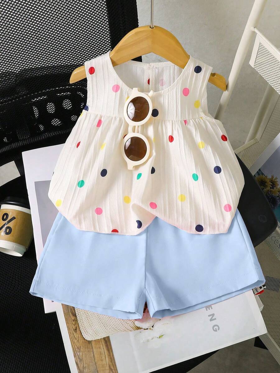 SHEIN 女婴白色纯色提花纹理面料圆领无袖露脐褶皱背心，饰以彩色波点印花，搭配粉色弹力腰舒适简约短裤，休闲度假装扮，春夏皆宜。 - 藍色 - 查看 1