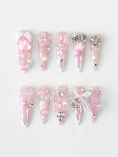 Anime 10 uñas postizas de alta calidad con elementos decorativos hechos a mano como moños, alas, rosas, estrellas, coronas de amor, en un estilo francés dulce y removible de forma almendrada larga, adecuadas para fiestas, bailes de graduación y uso diario, con 3 cintas adhesivas de doble cara incluidas.