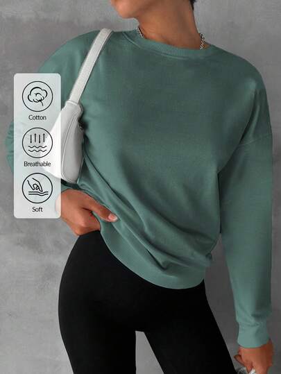 EURMUSE Women Casual Solid Color Round Neck Drop Shoulder Pullover Sweatshirt