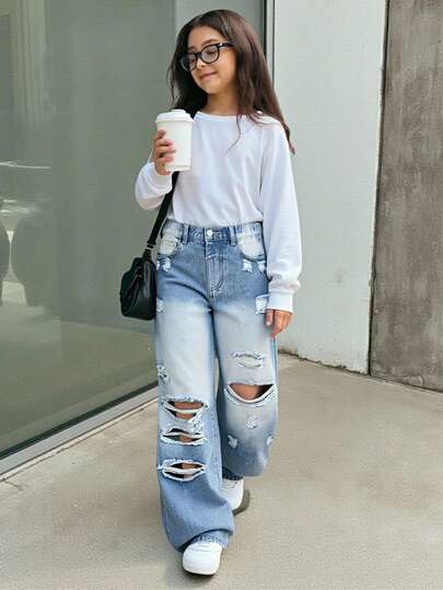 少女水洗做旧牛仔裤，宽松阔腿版型，舒适纯棉面料，适合休闲、上学、工作、聚会等场合。