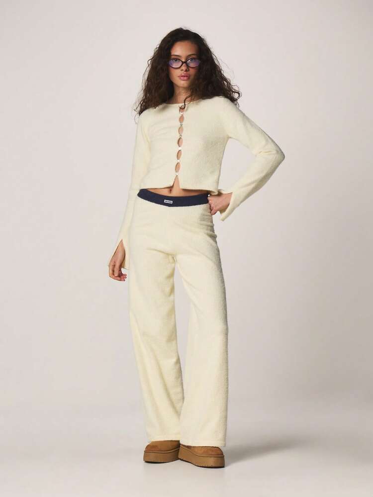 MISSGUIDED Przytulne kremowe dzianinowe spodnie z szerokimi nogawkami i kontrastowym granatowym paskiem na jesień i zimę