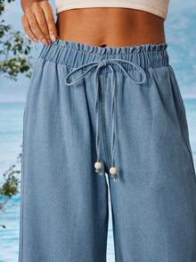 Travachic Quần jeans nữ dáng rộng, màu trơn, cạp chun, ống rộng, kiểu dáng thường ngày. - Rửa nhẹ - Xem 3