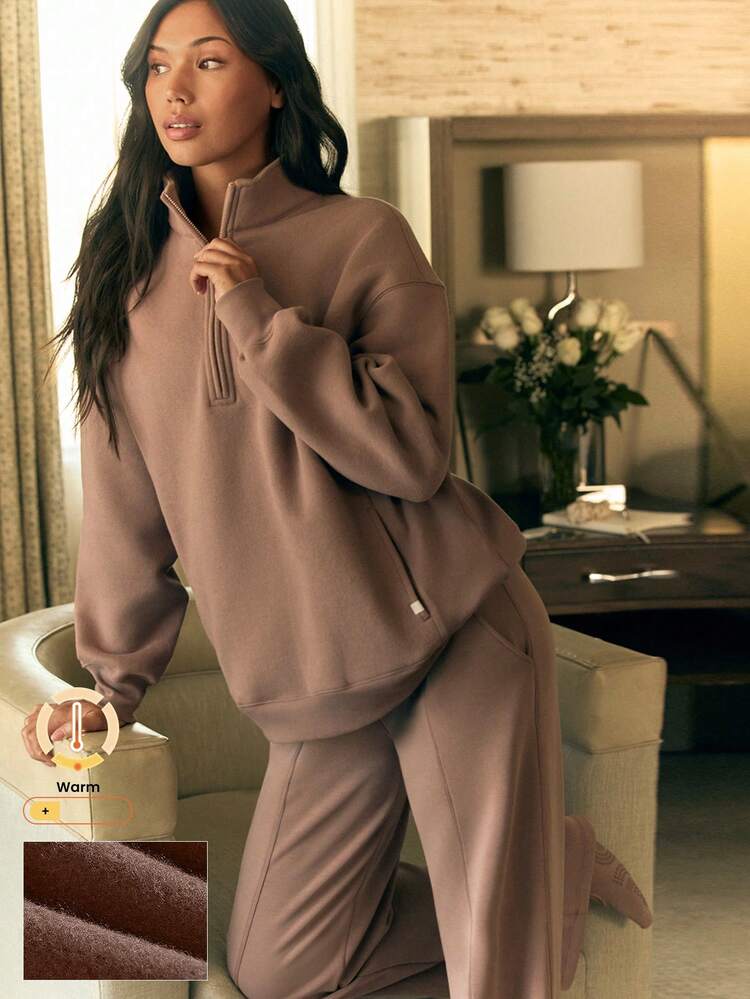 毎日着られるフリース ルーズヒップ丈 ハーフジップ 長袖スウェットシャツ サイドポケット付き デイリーカジュアル 秋冬