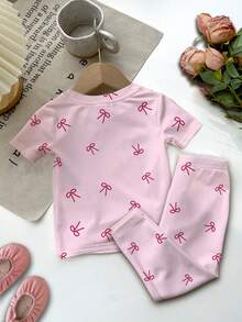 SHEIN Leap Crew Bộ đồ đôi cho bé gái dễ thương, kiểu dáng chấm bi nơ nhỏ, phong cách ba lê ngọt ngào, màu kem hồng, áo tay ngắn cổ tròn ôm sát và quần dài mặc nhà, phù hợp cho mùa hè, mùa thu, kiểu dáng mới, phong cách ngọt ngào, thời trang thu cho bé gái, ấm áp cho bé gái, thời trang hàng ngày cho bé gái, bộ hai món, dễ mặc và thoải mái. - Nhiều màu - Xem 4