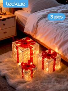 Teckwe 3 Pcs Christmas LED Lighted Gift Boxes, Transparent Warm White Lighted Christmas Box Decorations, Presents Boxes With Red Bows For Christmas Tree, Yard, Home, Christmas Decorations - Transparent + Red - View 1