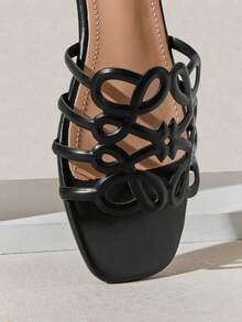 SHUZIA Women's Elegant Floral Cut-Out Slip-On Flat Sandals - Black - View 7