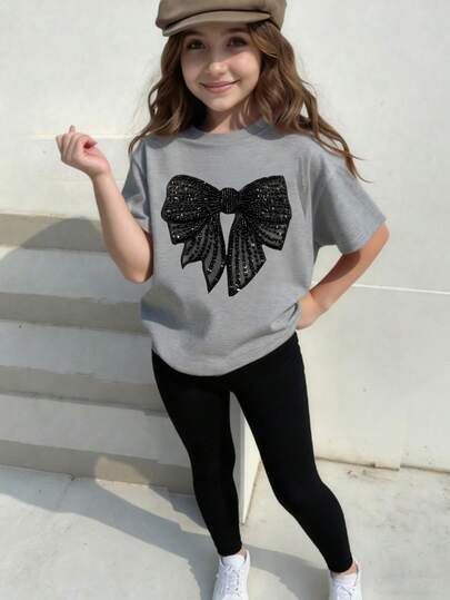 SHEIN Sparklyn Set de 2 piezas: Camiseta con estampado gráfico y lazo, y leggings casuales y elegantes para niñas, ropa cómoda para usar a diario en verano y otoño