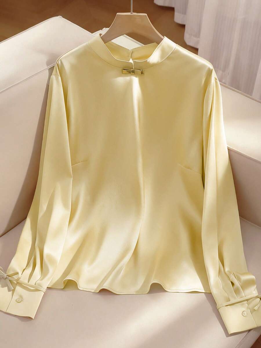 Elenzga 大码女式优雅通勤简约黄色立领衬衫，金色单结蝴蝶结袖口，蝴蝶结腰带，后开衩设计，透明黄色纽扣装饰长袖宽松衬衫 - 黃色 - 查看 1