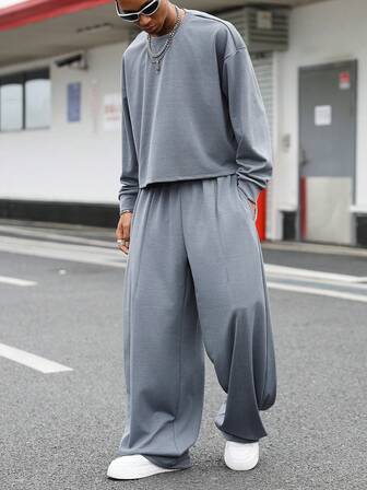 Manfinity Roghcode Men's Loose Fit Solid Color Drop Shoulder Casual Top And Elastic Waist Pleated Long Pants Set