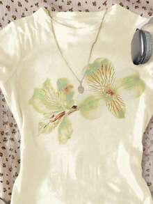 Áo thun dài tay cổ tròn dáng ôm, thoải mái, màu xanh bạc hà mát lạnh, họa tiết hoa dâm bụt và hoa sứ nhiệt đới thanh lịch dành cho bé gái tuổi teen, thích hợp mặc hàng ngày vào mùa xuân/hè, đi nghỉ mát, ở nhà, du lịch, khu nghỉ dưỡng biển, tận hưởng mùa hè thư giãn, không khí nghỉ dưỡng, thư thái, phong cách cô gái dừa, áo hoa cho bé gái, áo thun hoa cho bé gái - Nhiều màu - Xem 3