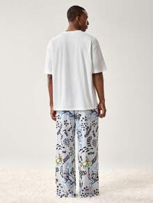 TOM & JERRY X SHEIN Conjunto de ropa de estar en casa con camiseta de manga corta y cuello redondo con estampado de dibujos animados y pantalones largos para hombre - Blanco - Ver 2