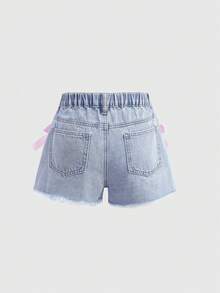 SHEIN Girlism 少女时尚休闲 Y2K 复古酷炫街头优雅浅色水洗做旧蝴蝶结牛仔短裤，带口袋插片、仿珍珠和毛边裤脚，是日常穿着、春夏锐舞派对和街头潮流的理想之选。SS26 新款时尚 - 藍色 - 查看 2