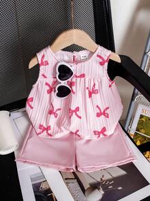 SHEIN 女婴白色纯色提花纹理面料圆领无袖露脐褶皱背心，饰以彩色波点印花，搭配粉色弹力腰舒适简约短裤，休闲度假装扮，春夏皆宜。 - 粉色 - 查看 9