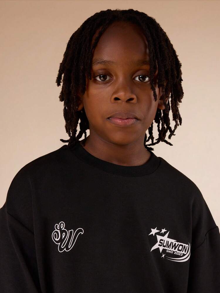 Oversized Crew Neck Tee With Star Logo Print