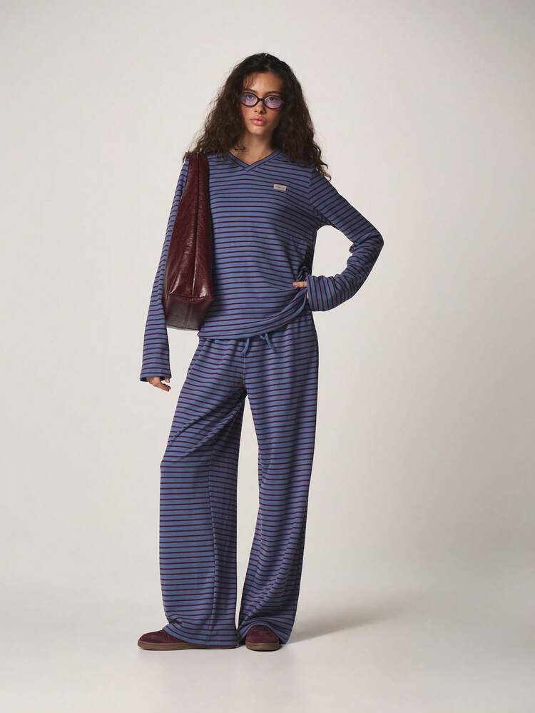 MISSGUIDED Conjunto de ropa de estar en casa de dos piezas con top de manga larga con cuello en V y pantalones de pierna ancha con patrón de rayas horizontales