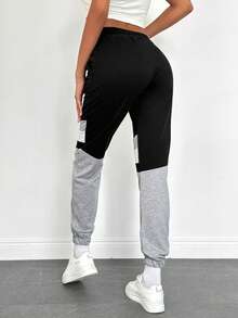 EURMUSE Pantalones de chándal con bloqueo de color, cintura con cordón y bolsillo en diagonal - Negro - Ver 2