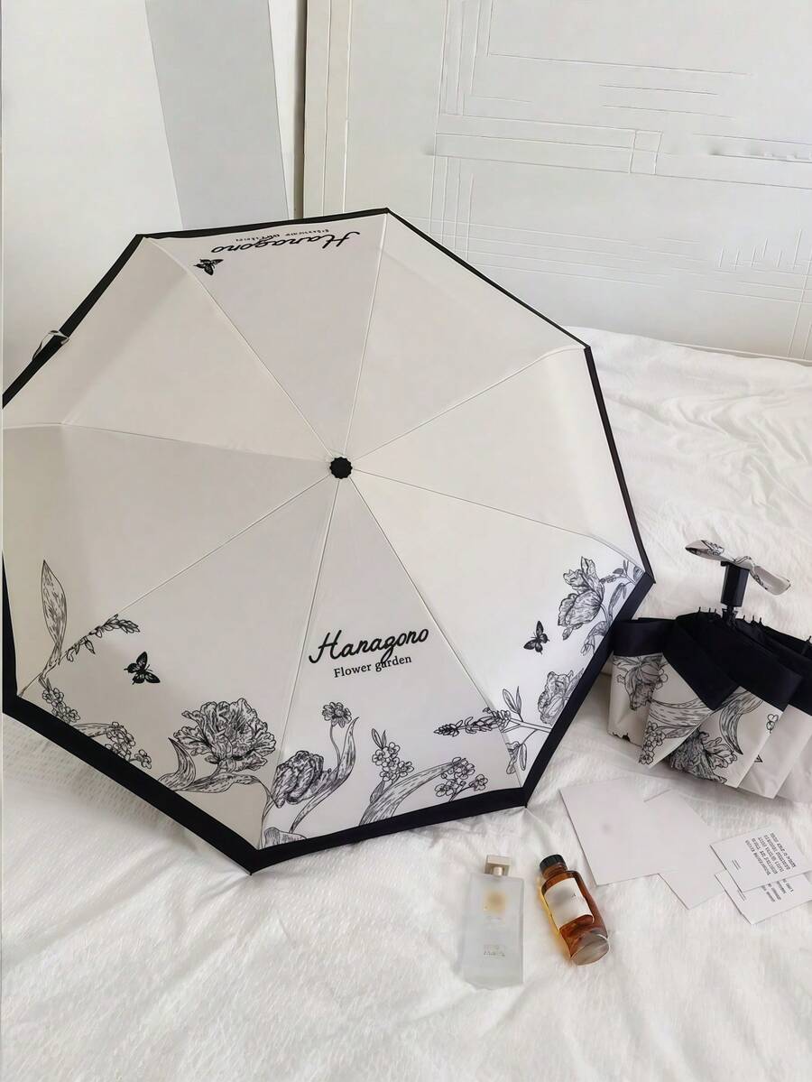 1把全自动开合伞，秘密花园印花，防晒防紫外线，可折叠，适合旅行，晴雨两用。 - 黑與白 - 查看 1