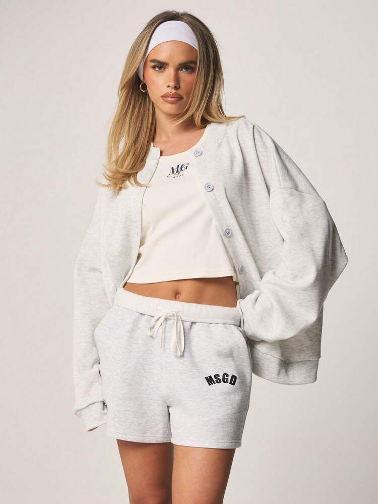 MISSGUIDED Short de jogging de haute qualité avec cordon de serrage à la taille et imprimé logo MSGD. Coupe décontractée pour l'été. Bas casual avec poches latérales