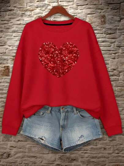 Sudadera estampada para mujer con corazón brillante – romántica, cómoda y moderna