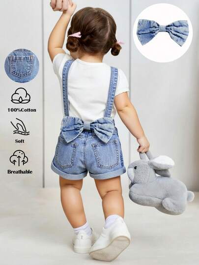 Salopette in jeans morbida per bambina con fiocco 3D decorativo sulla vita posteriore