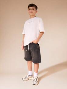 SUMWON Pantalones cortos de mezclilla lavados con ajuste relajado, costuras de contraste y bolsillos laterales para niños, bermudas casuales de longitud hasta la rodilla para vacaciones de verano - Negro - Ver 5