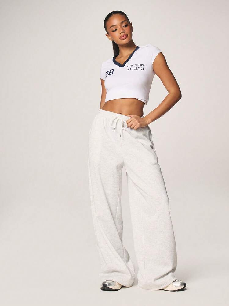 MISSGUIDED Heathered Light Grey Drawstring Wide Leg Sweatpants With Relaxed Jogger Style Elastic Waistband Perfect For Casual Loungewear And Comfortable Everyday Wear