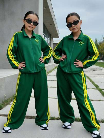 Sparklyn Stylish 2-Piece Outfit For Tween Girls: Vibrant Dark Green Fabric, Full-Zip Stand-Collar Jacket (Yellow Side Stripes + Bow Embroidery, Ribbed Cuffs/Hem) Paired With Matching Wide-Leg Pants (Coordinating Yellow Stripes, Relaxed Fit). Perfect For Casual Days, Sports Activities, Or Play-Blends Fun, Comfort, And Design With Eye-Catching Color Contrast.