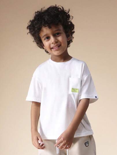 SUMWON Camiseta de cuello redondo de manga corta para niños con bolsillo en el pecho, básica casual para la escuela, el juego, el verano y la primavera