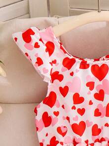 Elladie kids Valentine's Day  Girls' Elegant Red Heart Print Round Neck Puff Sleeve Hollow Back Bow Decor Waist Ruffle Hem Casual Dress, Suitable For Vacation, Travel, Summer, Valentine's Day Red Dress Little Girl Party Dress Girls Valentine Dress Toddler Heart Print Dress Kids Ruffle Short Sleeve Dress Girl Bow Dress Heart Print Dress Girl Cute Dress For Girls Fuffle Strap Dress Girls Valentines Dress Ruffle Dress Girl Heart Print Dress Casual Dress For Girl - Red - View 5