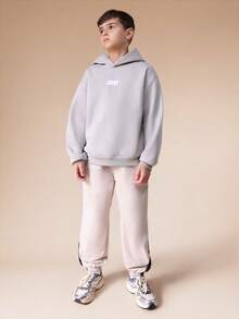 SUMWON بنطلون جوجر كاجوال مريح للأولاد من النايلون بخصر مطاطي وأطراف مطوية للراحة والأناقة اليومية والعطلات - كاكي - مشاهدة 3