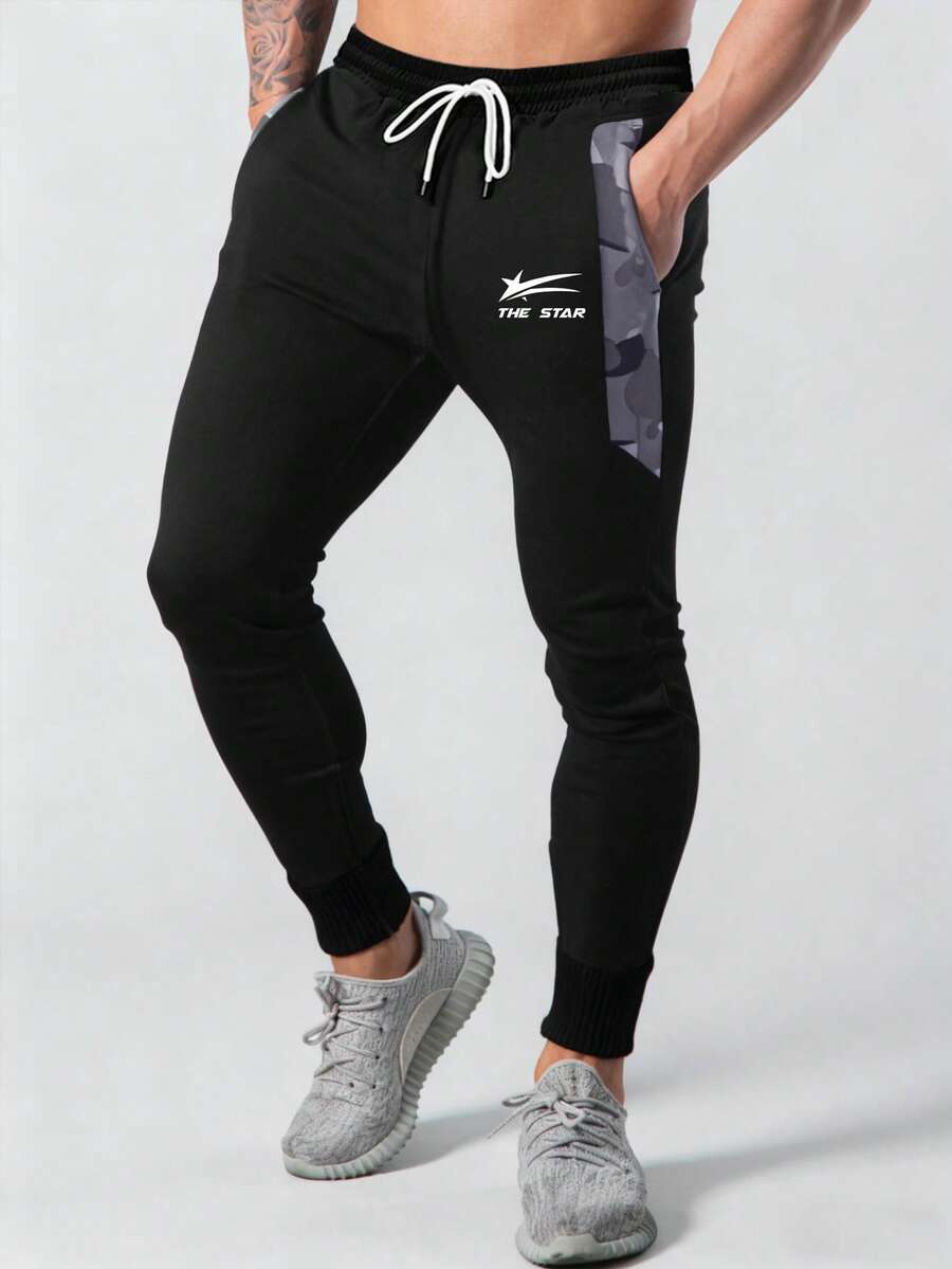 Manfinity Sport Corelite Quần dài đến mắt cá chân nam kiểu dáng rằn ri phối nhiều mảnh, có dây rút, thoải mái, đa năng, thích hợp cho mùa thu/đông. - màu đen - Xem 1