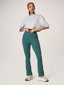 MISSGUIDED Pantalones de yoga con pierna acampanada y cintura alta con banda en forma de V para mujeres, leggings elásticos de corte acampanado para fitness - Verde Oscuro - Ver 3