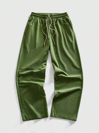 Pantalones casuales sueltos de pierna ancha con cordón en la cintura y bolsillos para hombre
