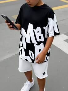 SHEIN 2pcs Kids/Teen Boys Casual Everyday Versatile Comfortable Printed Pattern Crew Neck Loose Fit Short Sleeve T-Shirt And Shorts Knit Set Oversized T Shirts Oversized T Shirt Boys Oversized Tees - Black and White - View 8