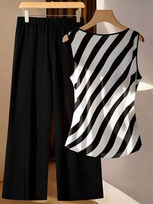 GlowEve CURVE 1 Bộ đồ nữ cỡ lớn gồm áo không tay buộc dây phía trước và quần ống đứng dáng rộng. - Đen và trắng - Xem 2