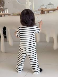 SHEIN Baby Girls' Casual Apricot Striped Jacquard Fabric Round Neck Short Sleeve Top And Striped Pants Set, Suitable For Everyday Wear, Spring/Summer - Apricot - View 2