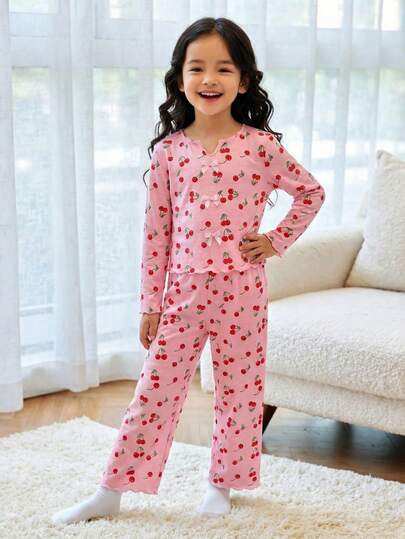 Ropa de estar en casa cómoda y casual para niña con estampado de cerezas y decoración de moño