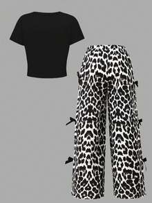 Sparklyn Tween Girls' Summer Back To School T-Shirt Set, White Solid Knit Fabric With Leopard Print & English Letter Graphic T-Shirt Top Paired With Black Bow Accent Woven Fabric Casual Pants, 2pcs Outfit Suitable For Summer, Casual, Fashion, Street Style, Back To School, Travel, Photo Shoot Cheetah Print Girls Set Animal Print Top Leopard Print Pants Ladies Casual Fashion Animal Print Outfit Leopard Print Set Baddie Outfit Cheetah Print Pants Leopard Outfit - Black - View 2