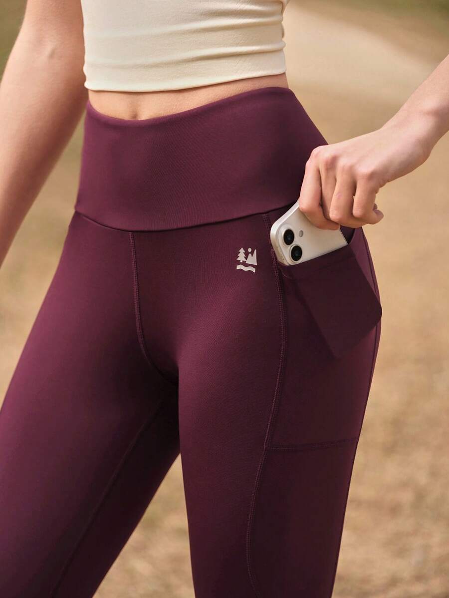 SHEIN Quần legging thể thao ngoài trời dành cho nữ hiệu In My Nature với đường may tương phản, thân thiện với da và thoải mái, có túi khóa kéo phía sau, phù hợp cho phòng tập thể dục, leo núi và chạy bộ. - Màu Đỏ Sâu - Xem 1