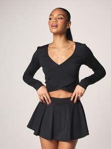 MISSGUIDED Blusa corta con detalle de envolvente y cuello en V para uso casual diario y para capas - Negro - Ver 4